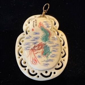 Intricate Faux Ivory Dragon Pendant